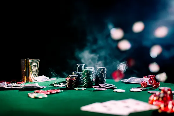 A close-up shot of golden coins falling around a spinning roulette wheel, representing immersive casino action at SUPERJILI.